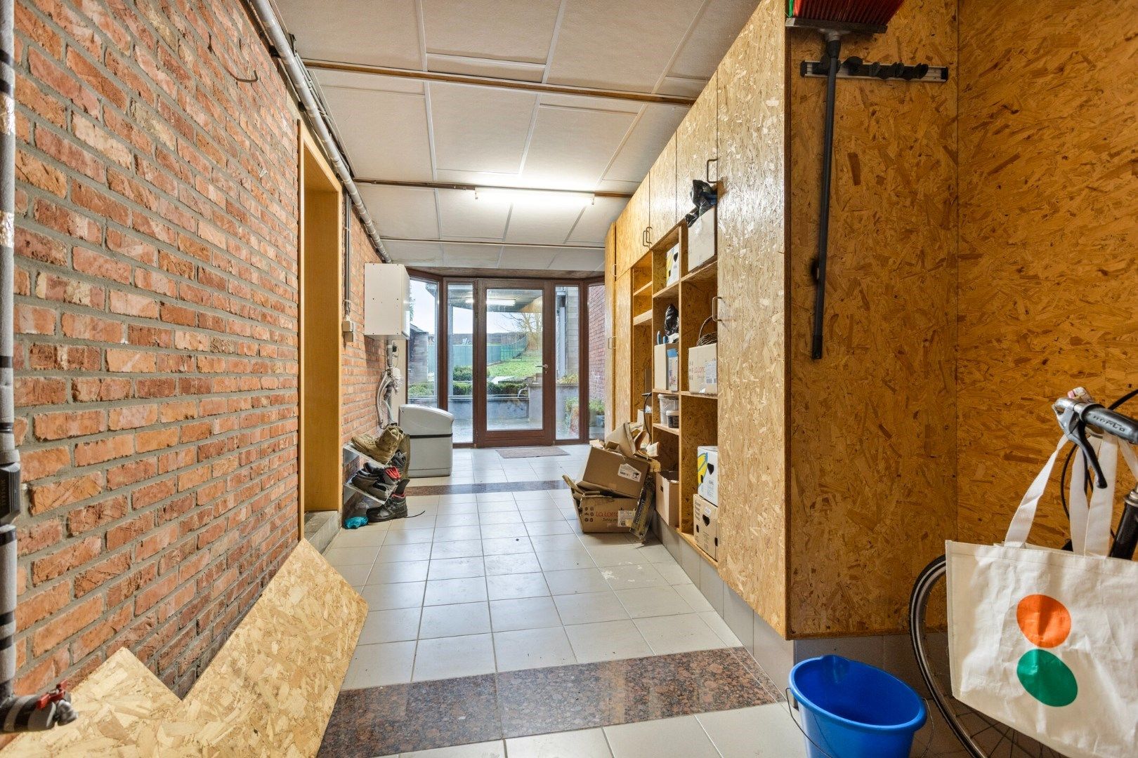 Verrassend ruime woning met knap terras en diepe tuin foto 12