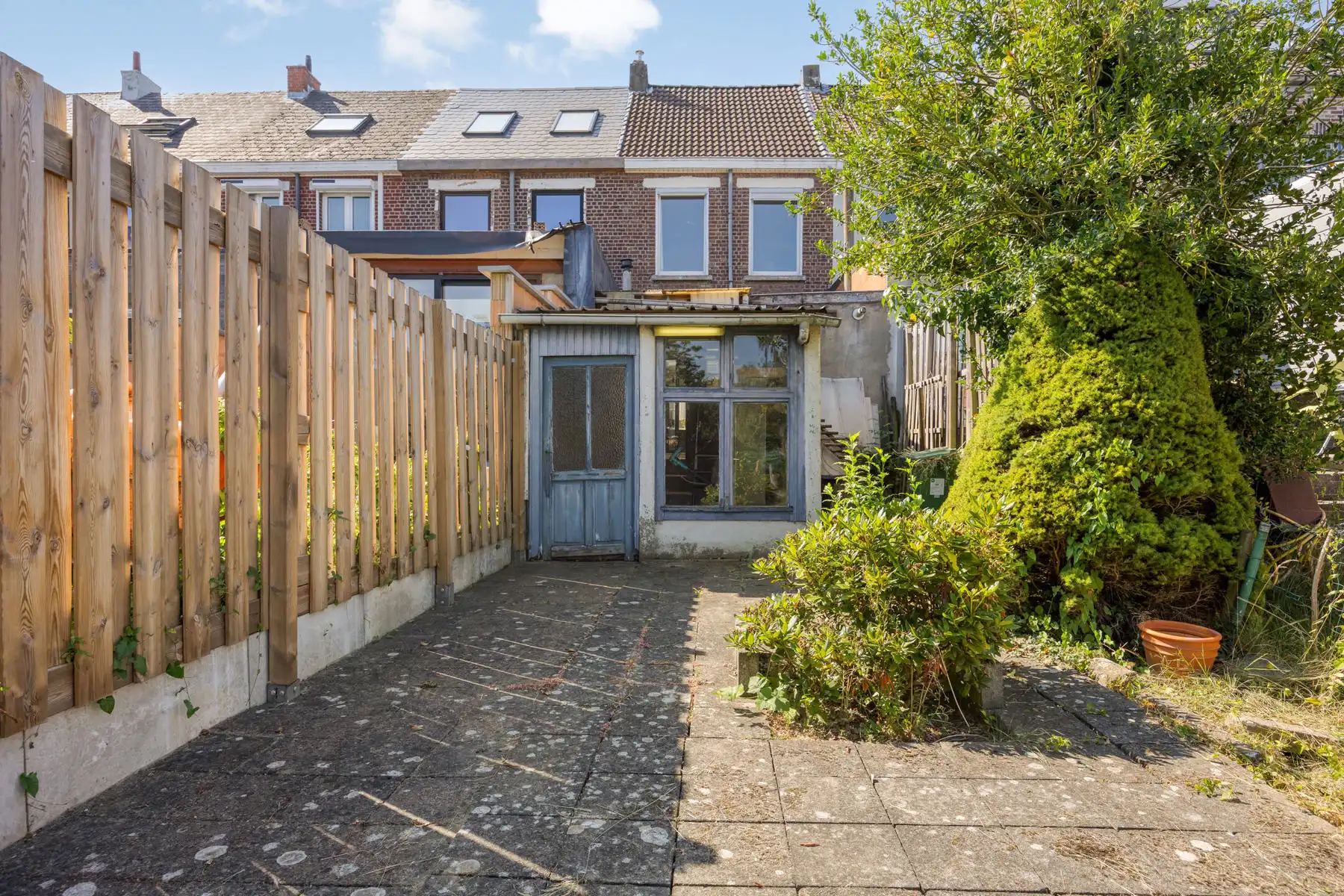 TE KOOP - gesloten bebouwing met 2 slaapkamers en tuin foto 14