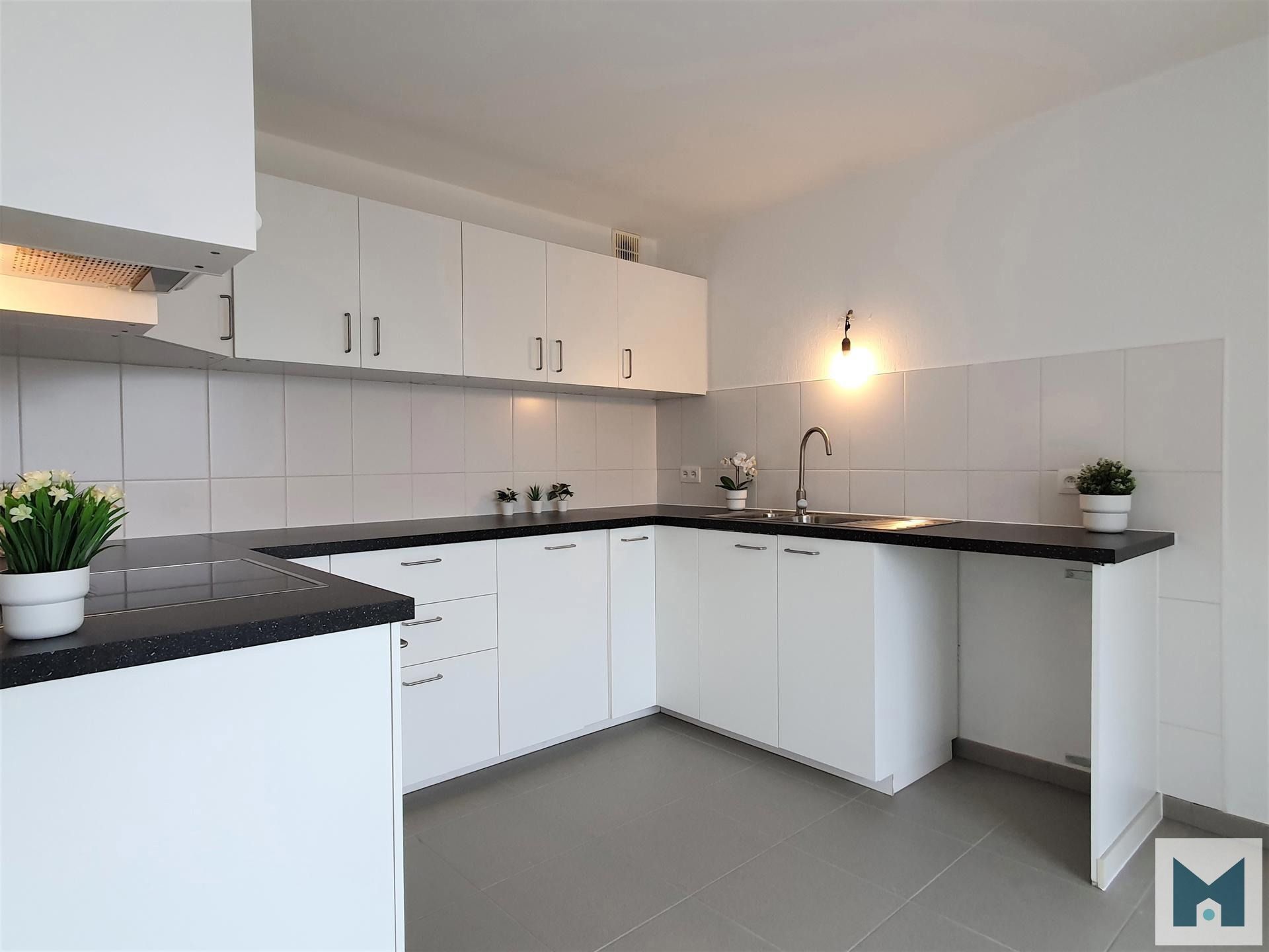 Ruim, modern appartement met 3 slpks te Buggenhout! foto 9