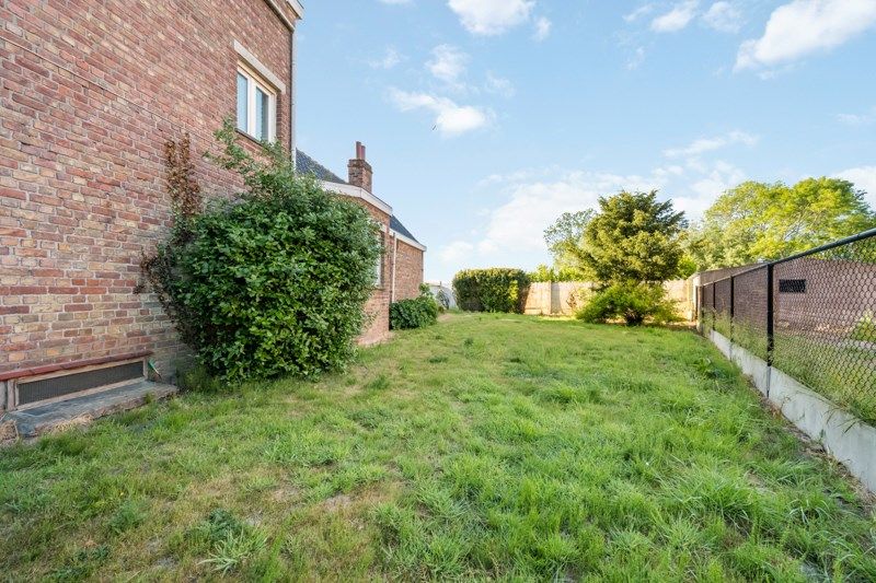 Te renoveren woning met een ruime tuin en zolder – een unieke kans! foto 10