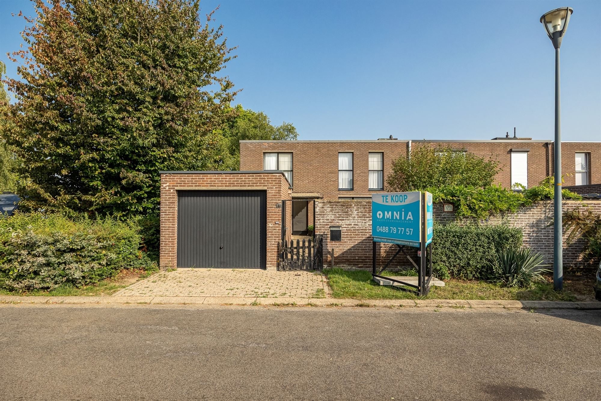 Halfopen gezinswoning met 4 slaapkamers foto 24