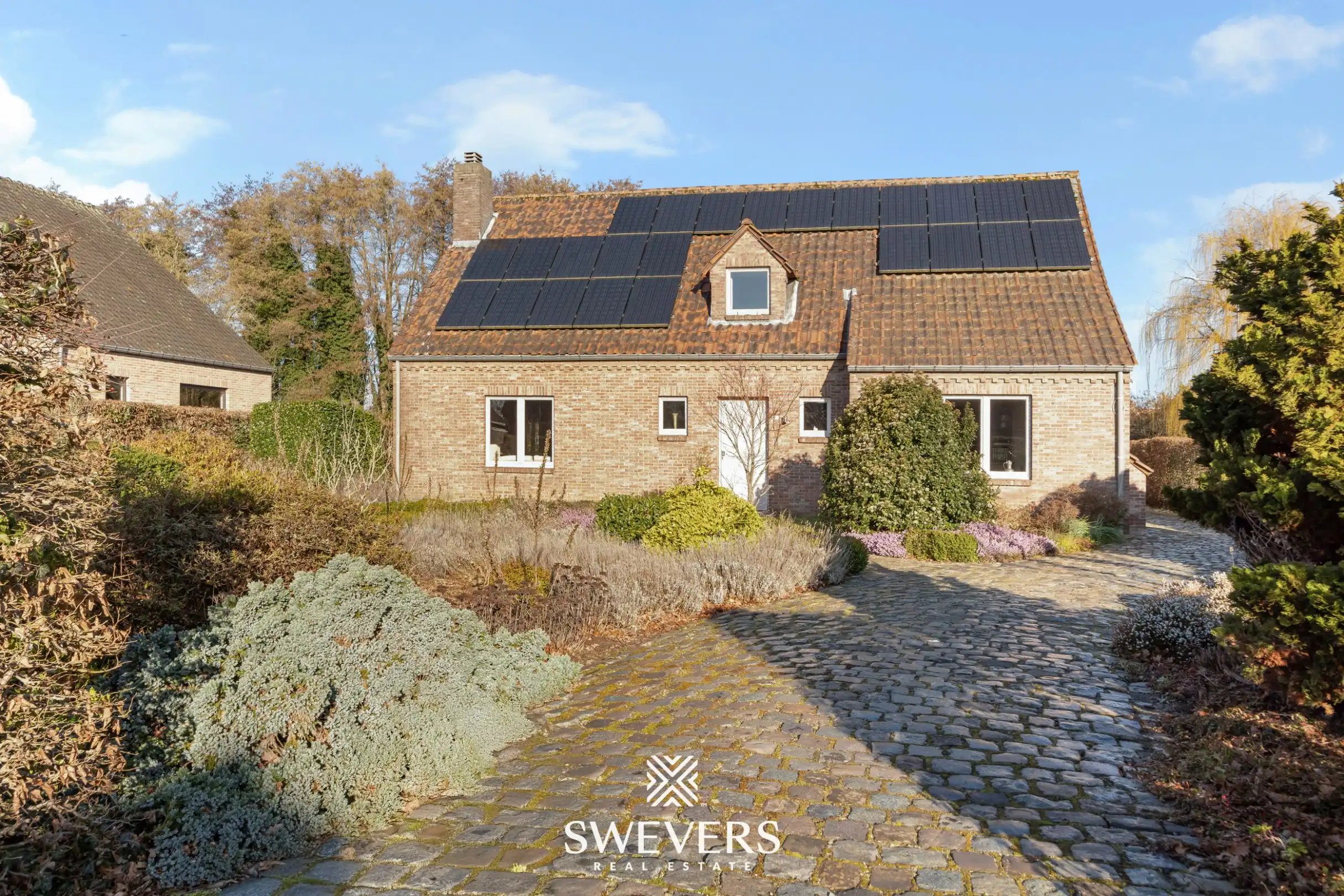 Charmante woning met drie slaapkamers te Heusden-Zolder   foto {{pictureIndex}}