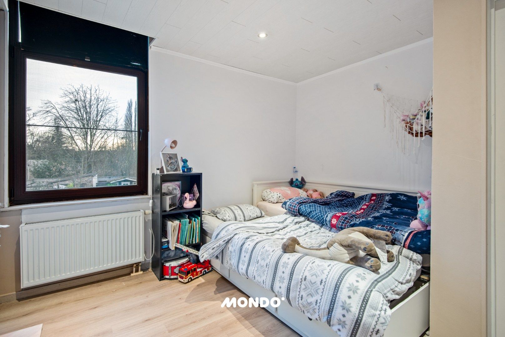 Instapklare woning met 4 slaapkamers en ruime tuin in hartje Niel! foto 13
