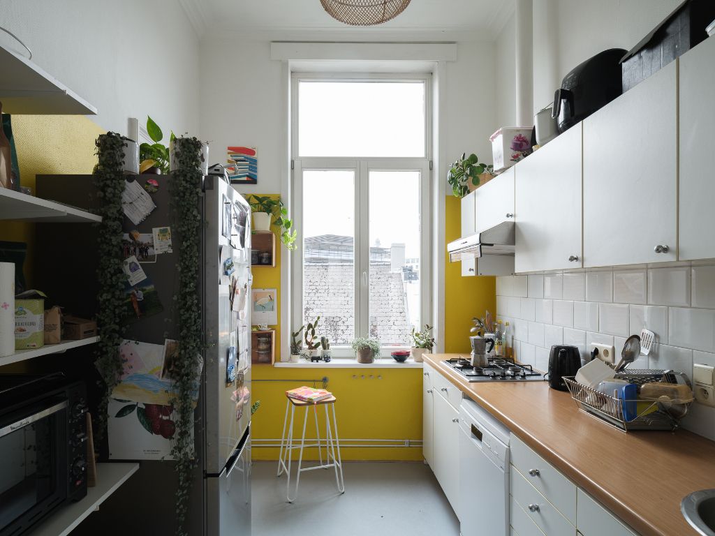 Bijzondere opbrengsteigendom bestaande uit o.m. twee handelsruimtes en twee ruime appartementen foto 10