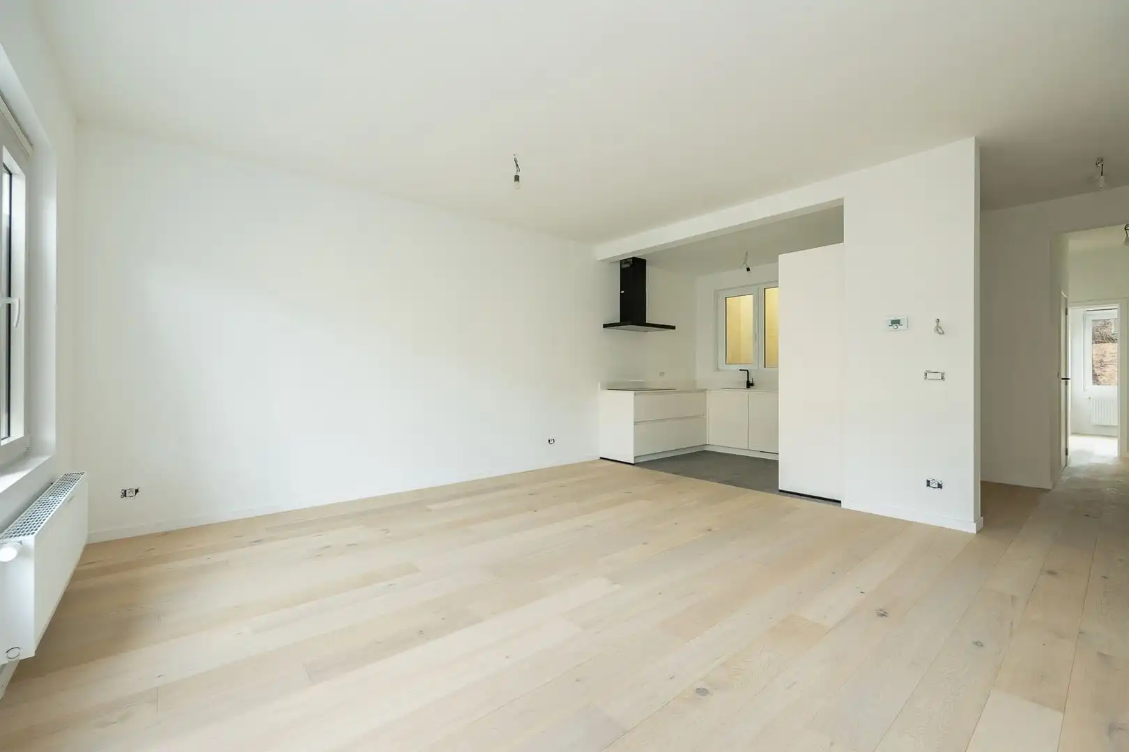 Ruim en licht 2-slaapkamerappartement met dakterras foto 4