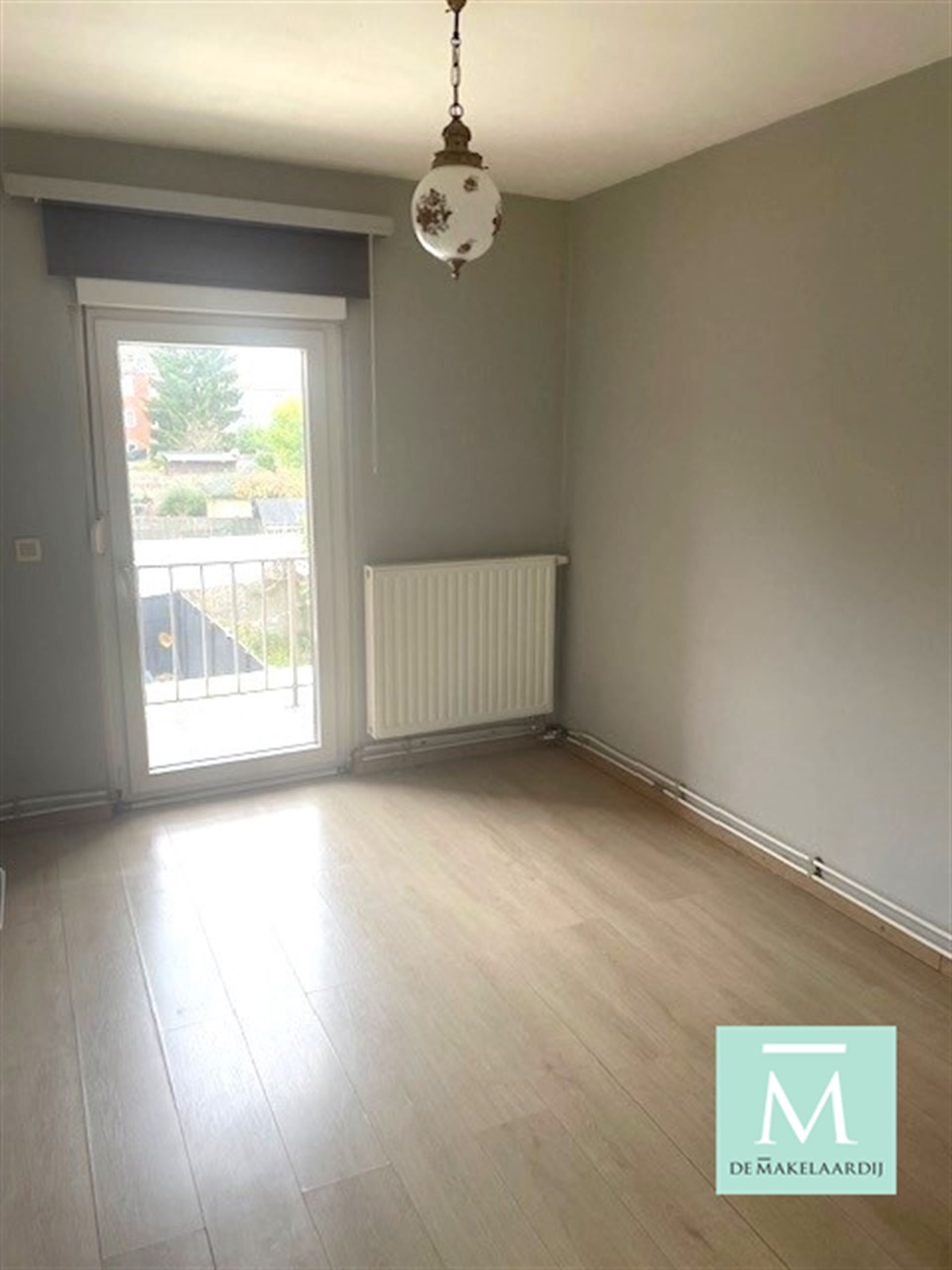 Mooi gelegen, instapklaar appartement met 2 slaapkamers en klein terrasje achteraan! foto 7