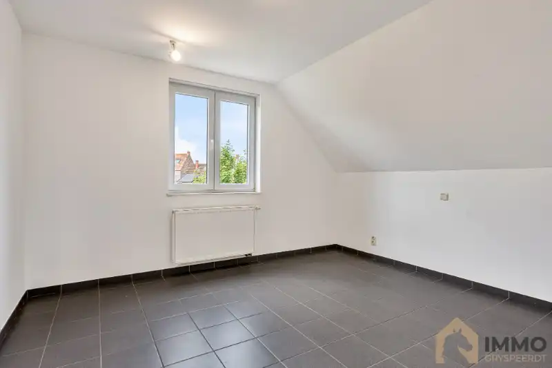 Te koop in Staden – Instapklare energiezuinige gezinswoning met garage, tuin en kelder foto 16