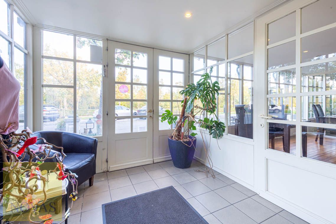 Authentiek handelspand / hotel met restaurant, feestzaal en mooie tuin op ideale locatie. foto 3