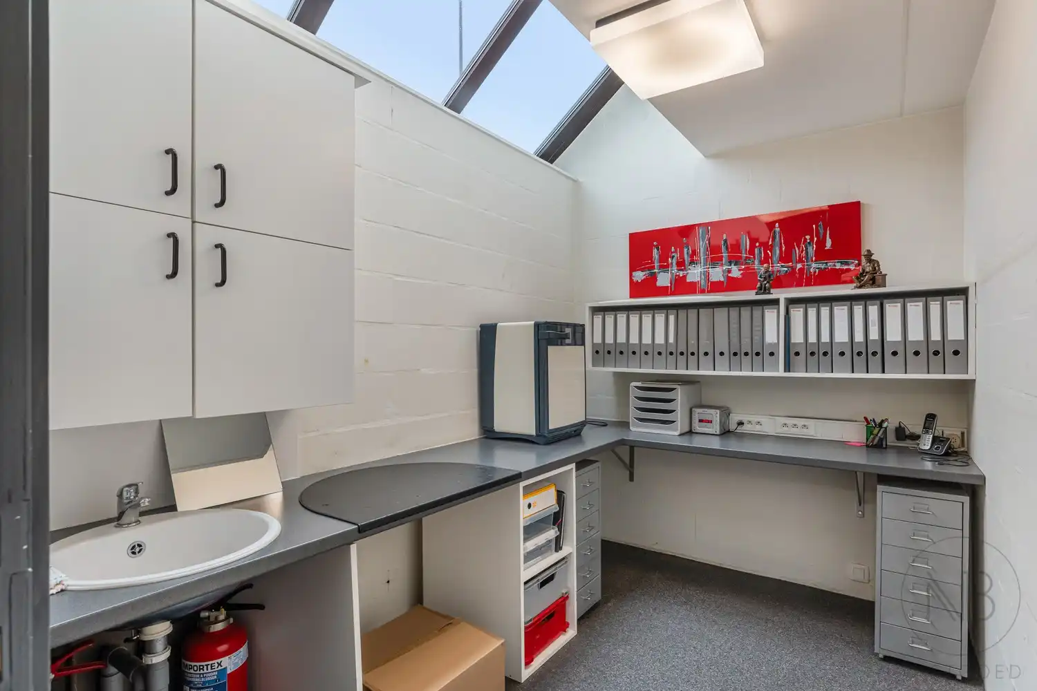 Pand met vergunde praktijkruimte, woonst, garage en carport in Opglabbeek foto 18