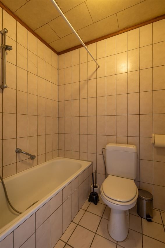 Verzorgd gebouw met handelszaak en 2 apt foto 34