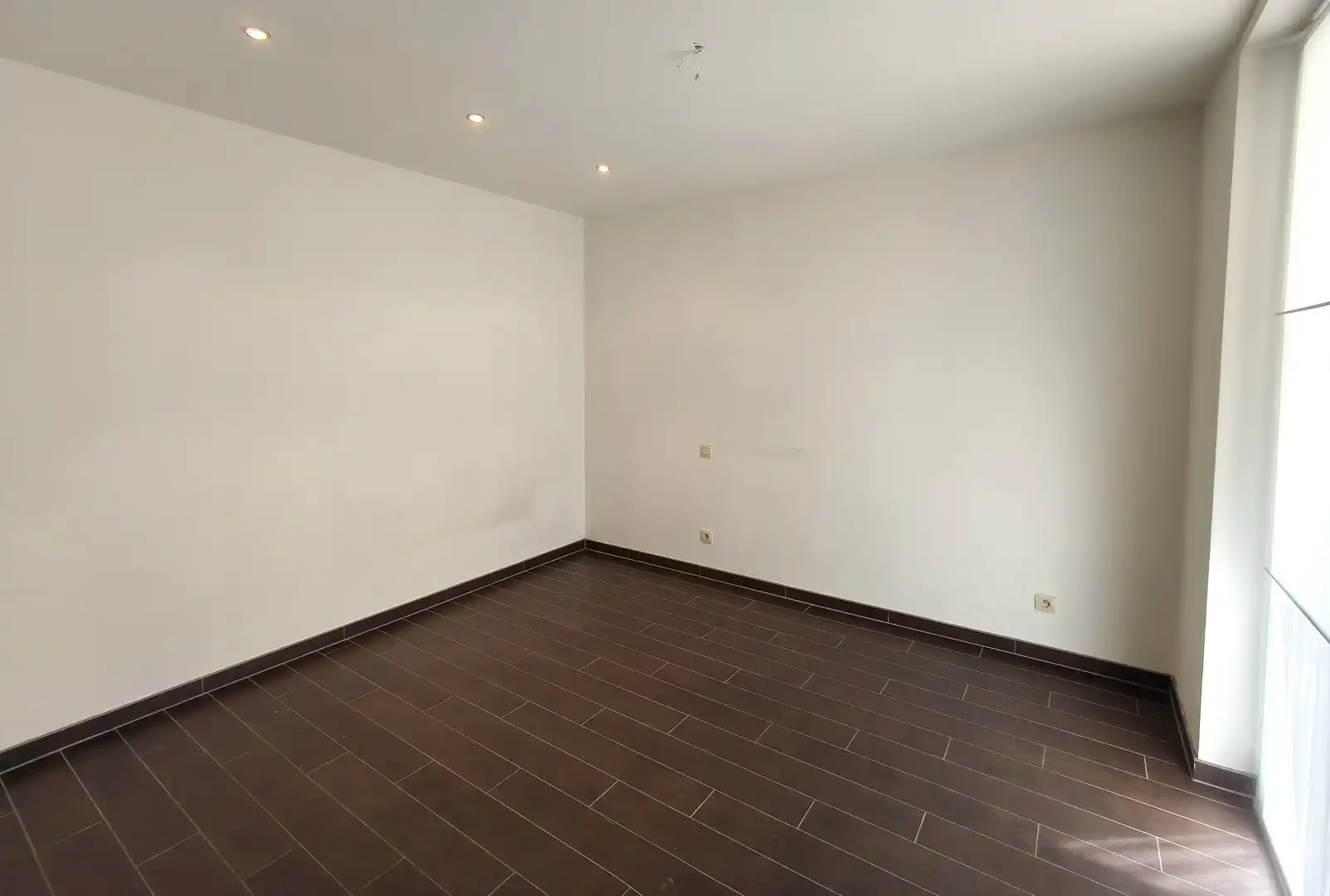 GELIJKVLOERS APPARTEMENT MET RUIM ZONNETERRAS EN GARAGE foto 8