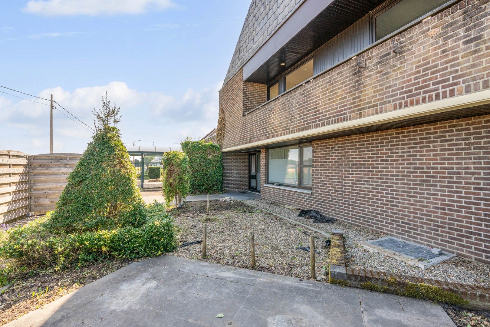 Multifunctioneel gebouw bestaande uit een woning, een winkel en een magazijn/werkplaats gelegen op een rustige locatie te Voorshoven! foto 32