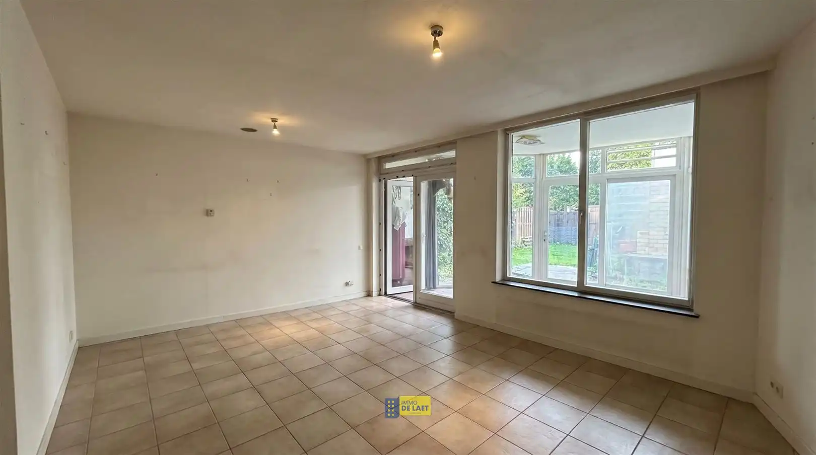 Gelijkvloers appartement met tuin foto 2