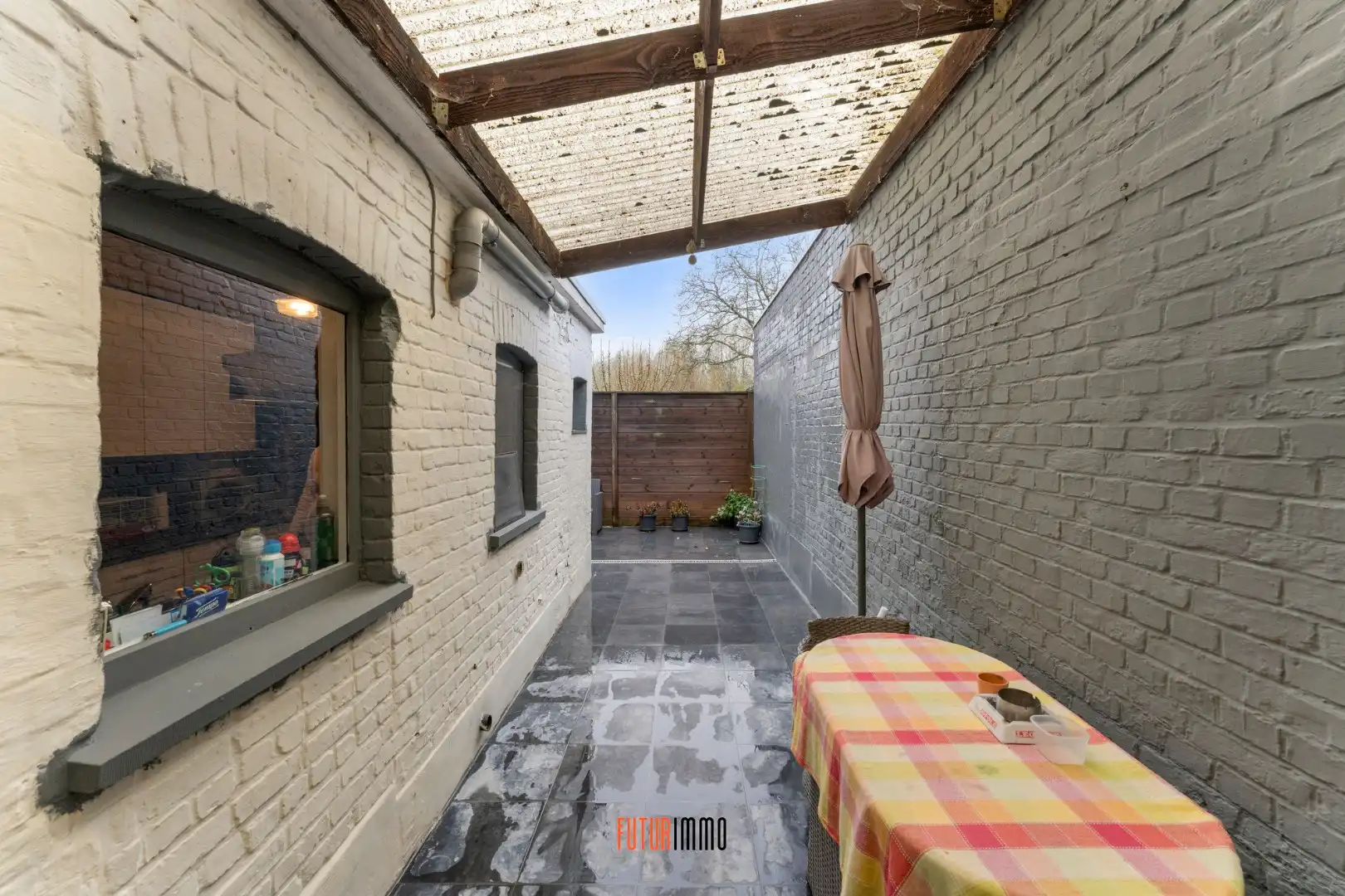 Te renoveren rijwoning met goeie ligging foto 8