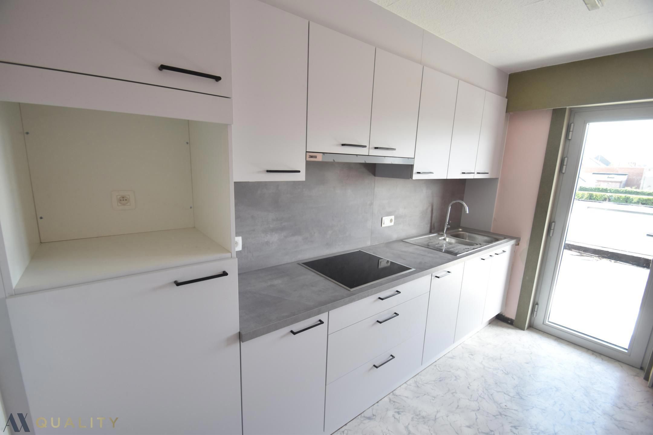 Centraal gelegen 2 slpk-appt (85 m²) met terras! Mogl. tot huren van een garage foto 3