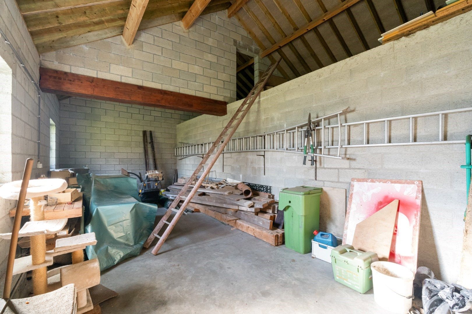 Statige herenwoning met tuin, herbestemd tot meergezinswoning met twee wooneenheden en garages in het centrum van Hoeselt foto 15