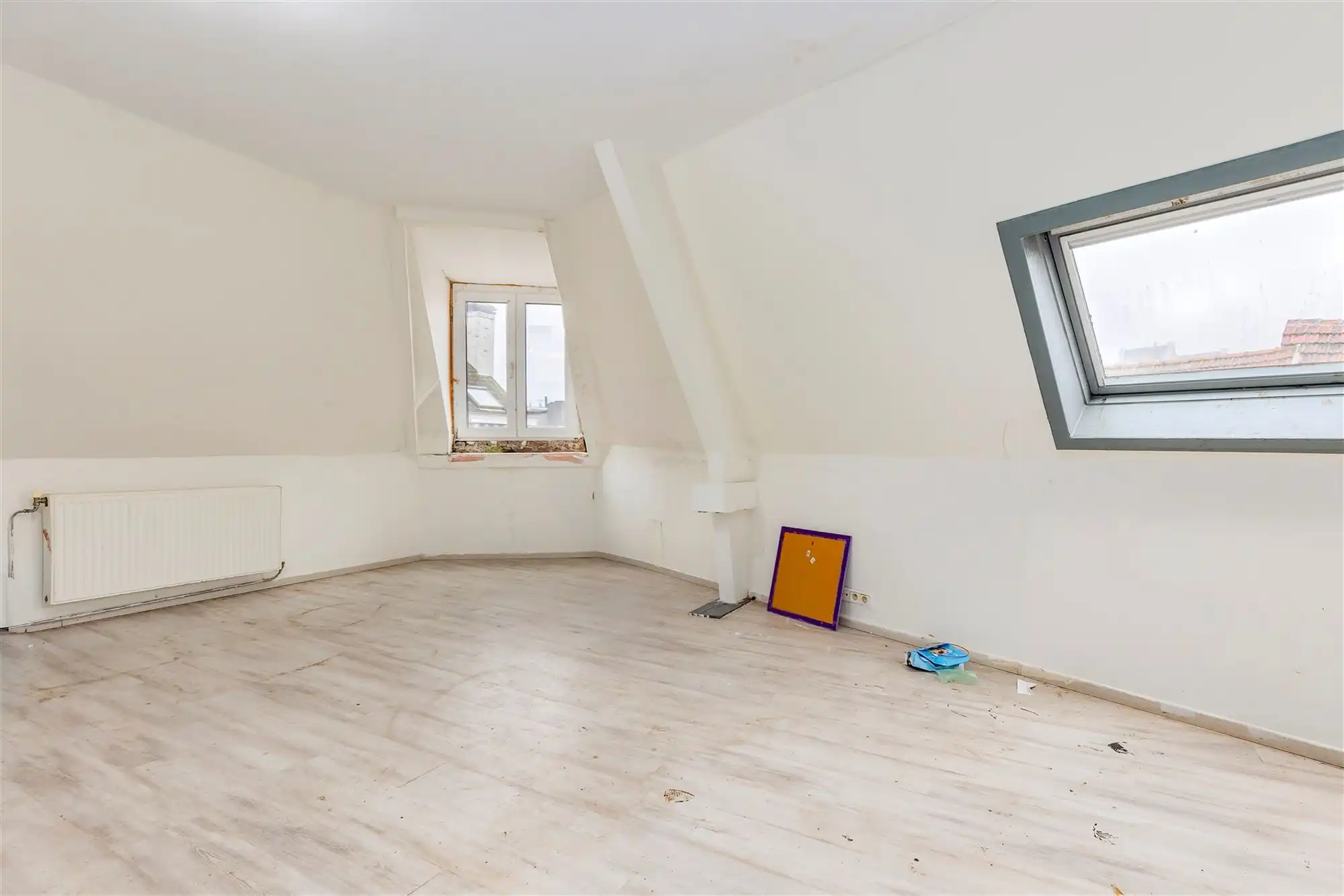 Hoekpand bestaande uit handelsglvl + 6 appartementen foto 12