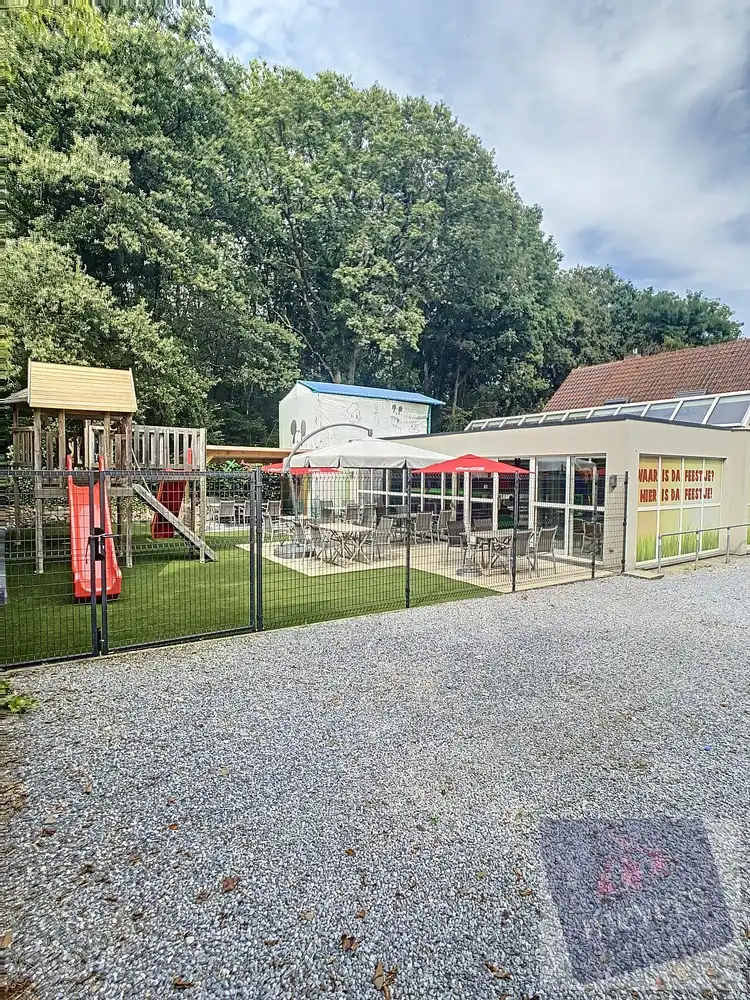 Handelsruimte met woonst op zichtbare ligging in Koersel foto 15