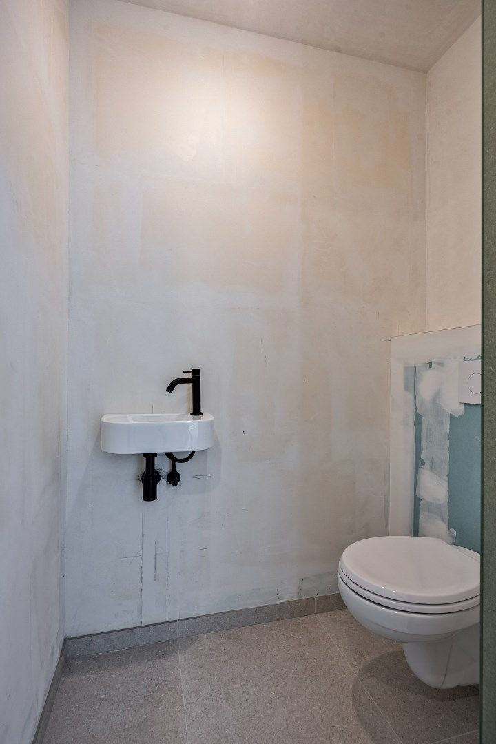 Luxueus gelijkvloers 3-slaapkamerappartement met tuin en terras! 6% BTW mogelijk  foto 25