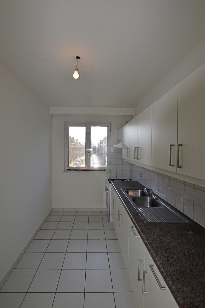 Verzorgd 2-slpk appartement met grote tuin te Borsbeek. foto 4