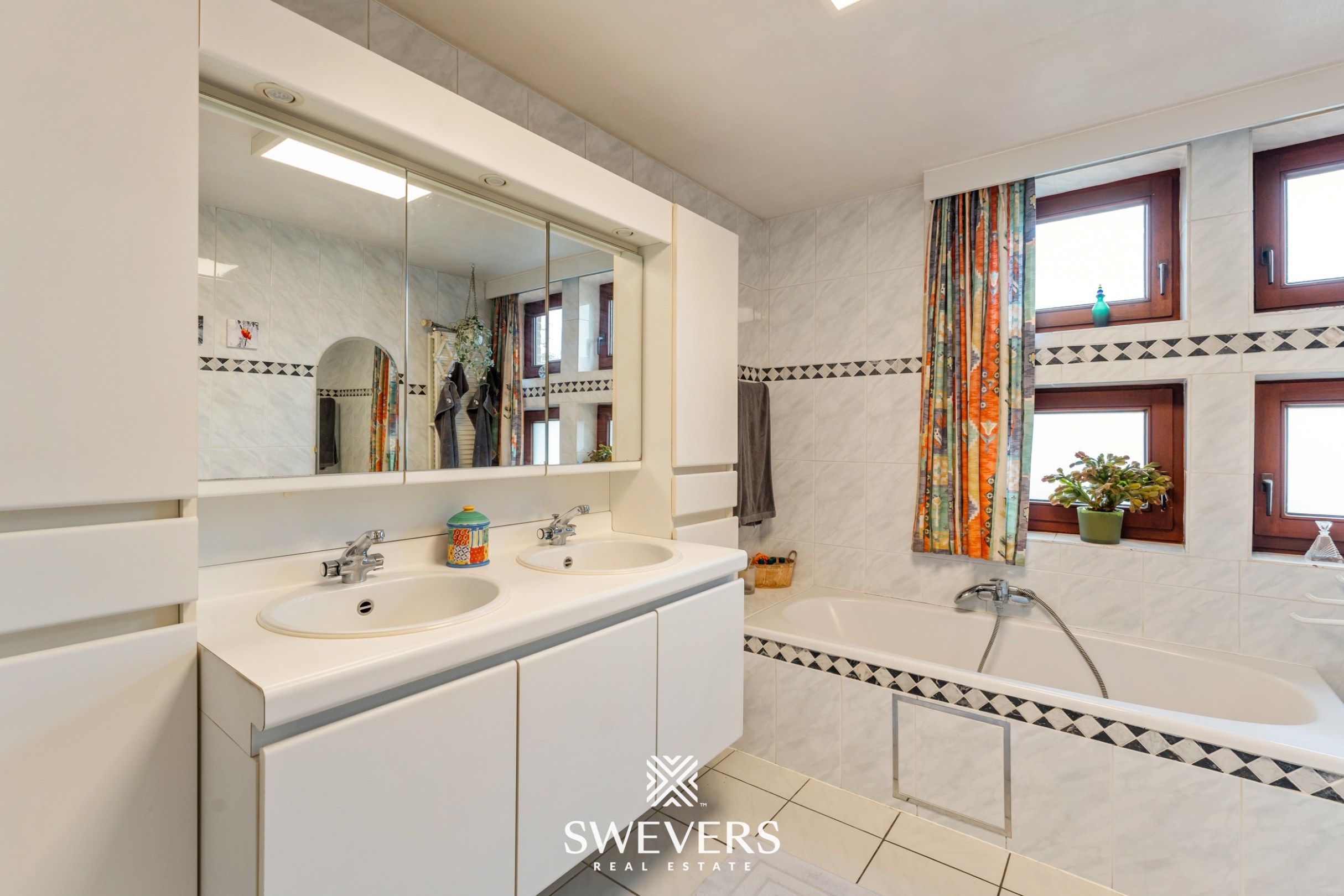 Opbrengsteigendom: lichtrijke en instapklare woning op 9a75ca nabij Hasselt centrum foto 28