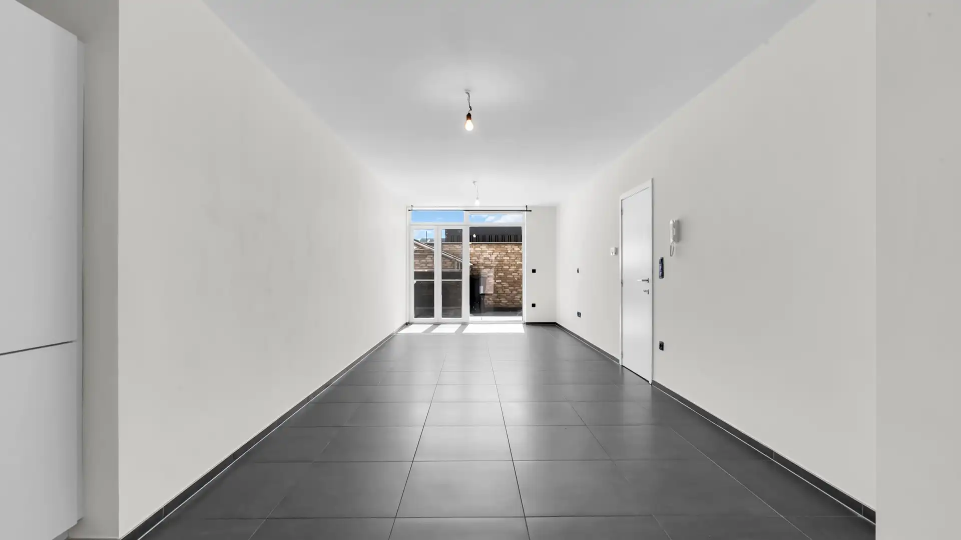 Energiezuinig gelijkvloers appartement met een ruim terras te Maasmechelen foto 3
