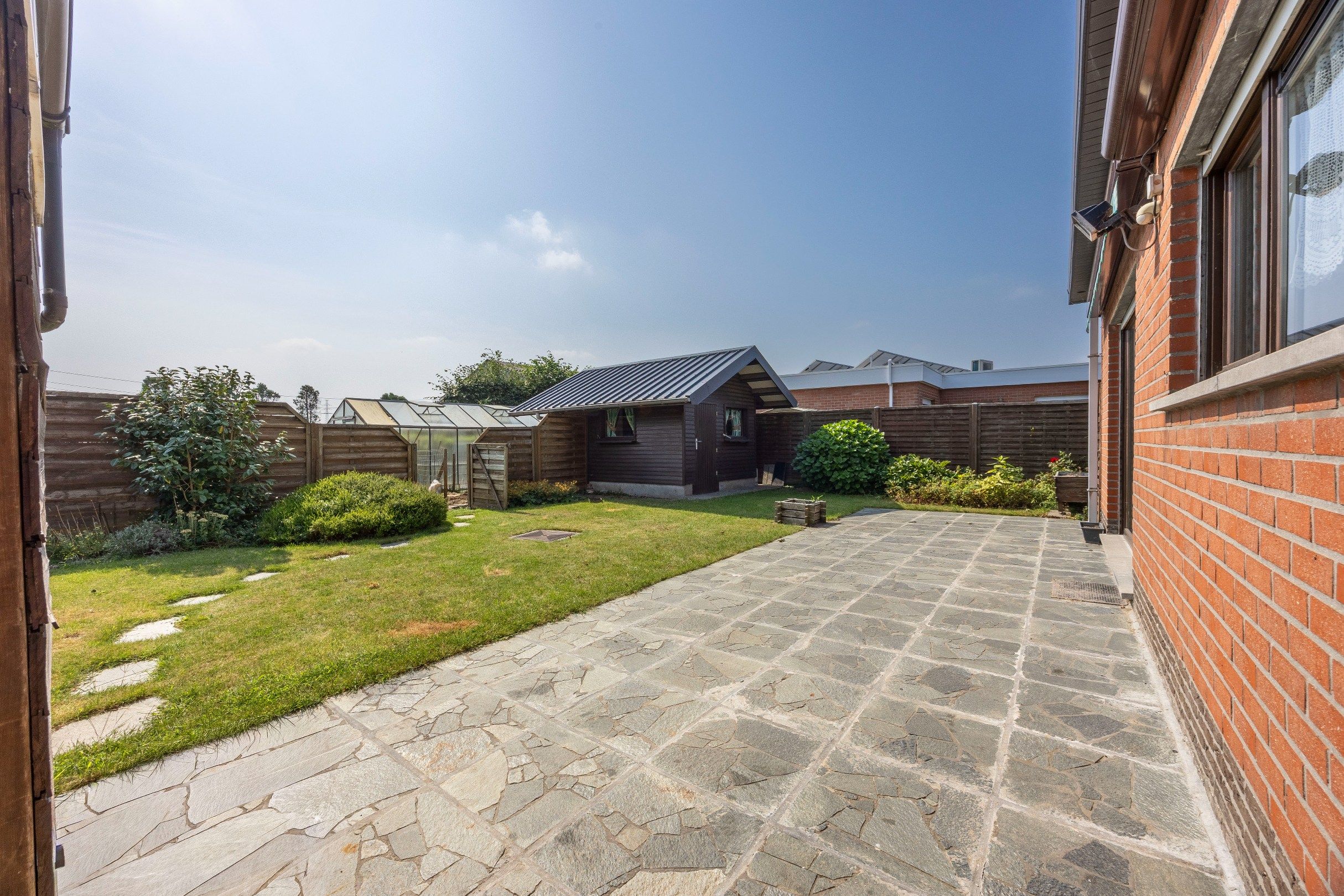 HALFOPEN WONING MET TUIN EN GARAGE foto 12