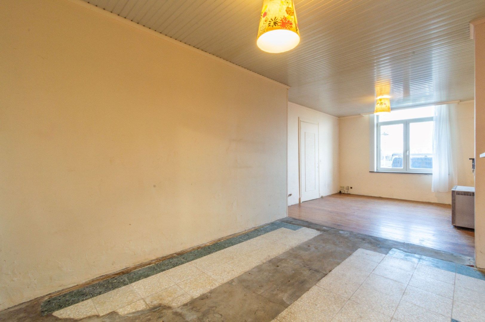 Ruime, te renoveren woning met 4 slaapkamers + zuid-tuin! foto 10