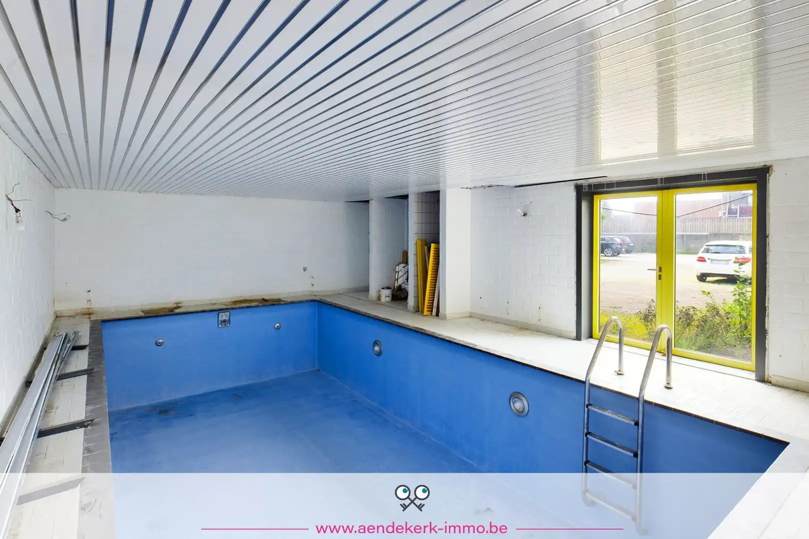 Woning met handelsruimte in het centrum van Kinrooi foto 23