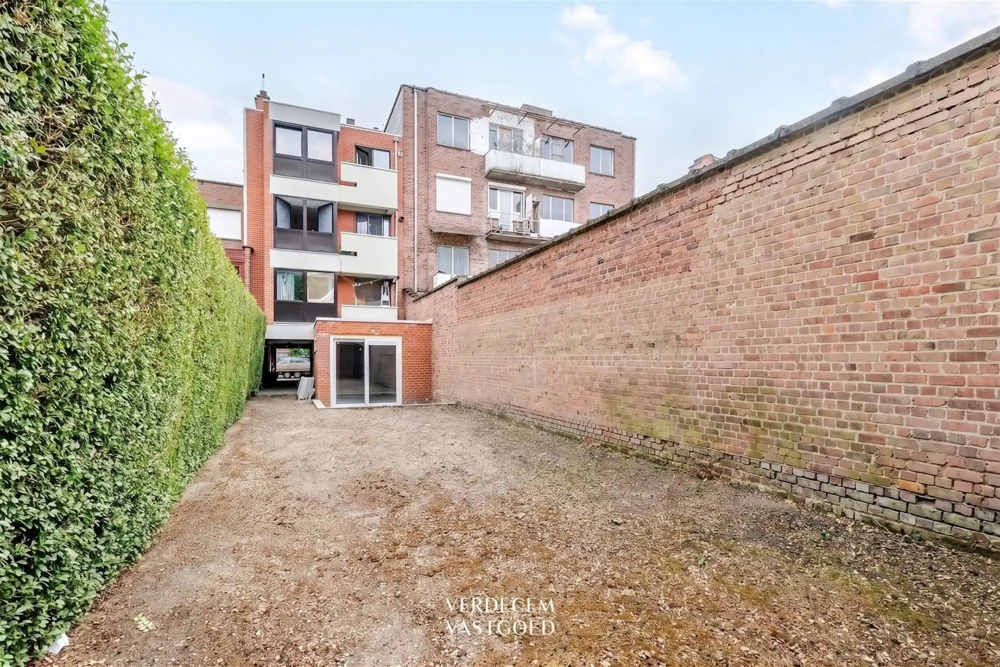 Opbrengsteigendom op topligging bestaande uit 4 appartementen en tuin foto 14