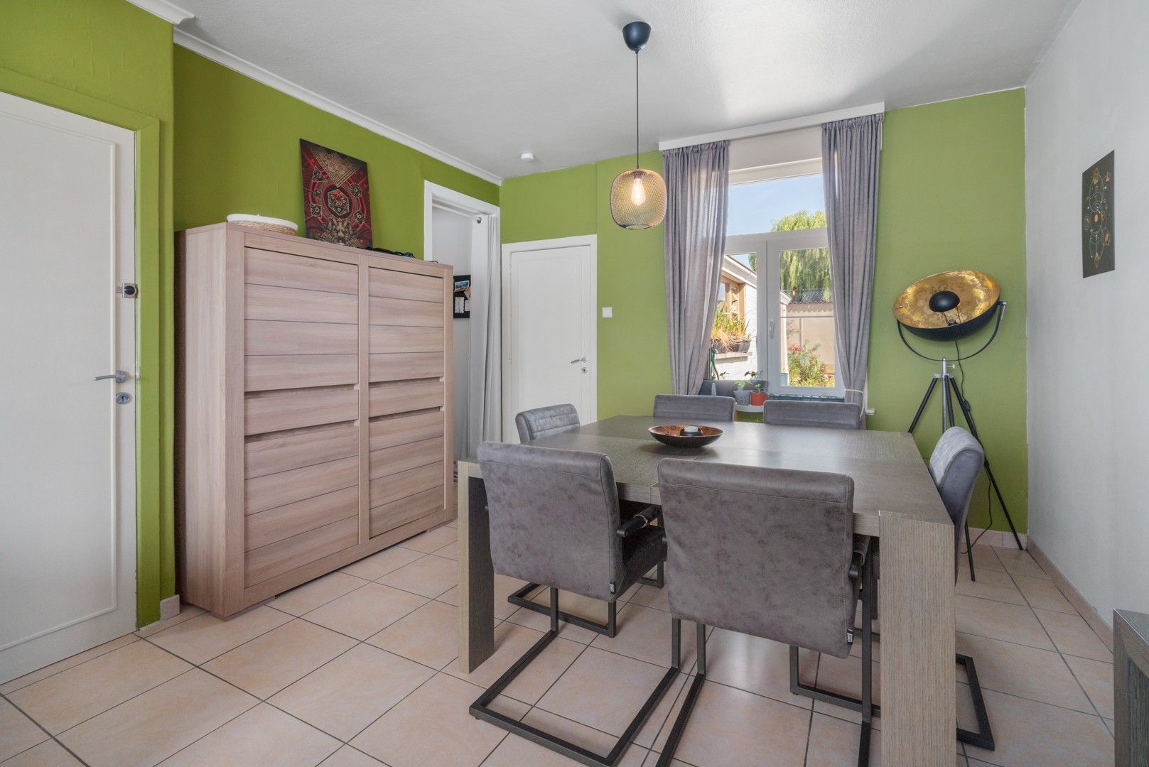 Halfopen woning met tuin en garages in het centrum van Nevele! foto 12