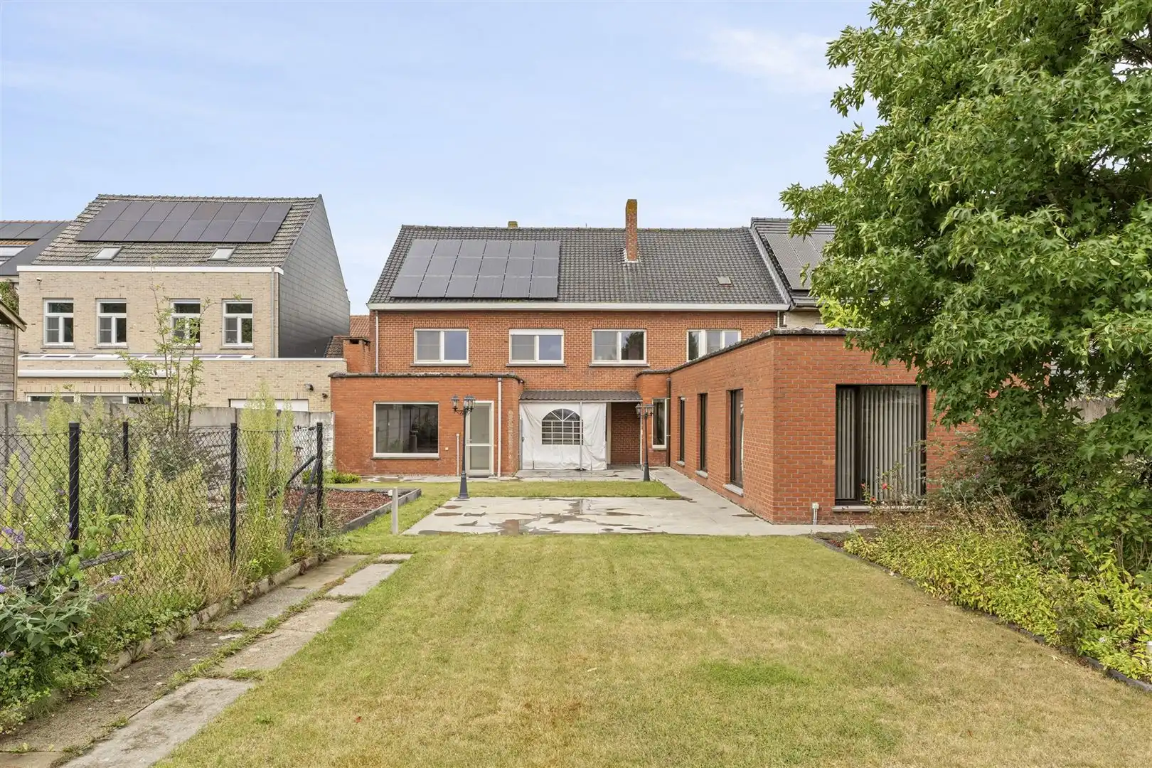 Zeer ruime woning met prachtige tuin foto 26