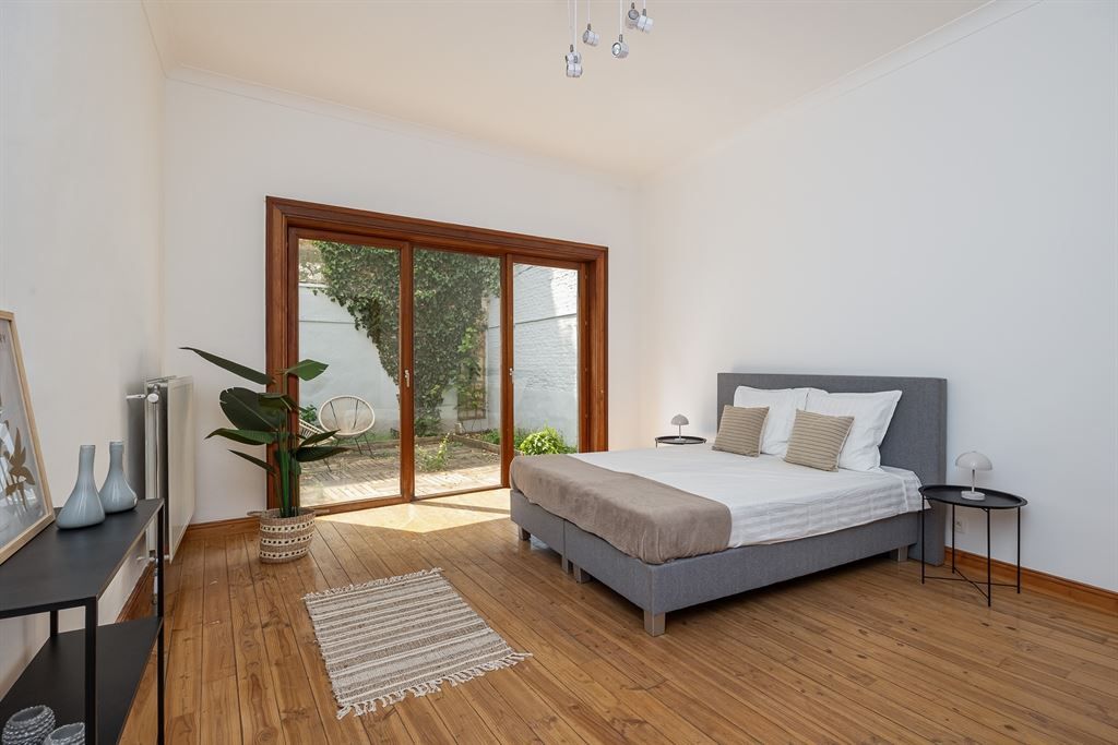 Uitzonderlijk gelijkvloersappartement met stadstuin foto 3
