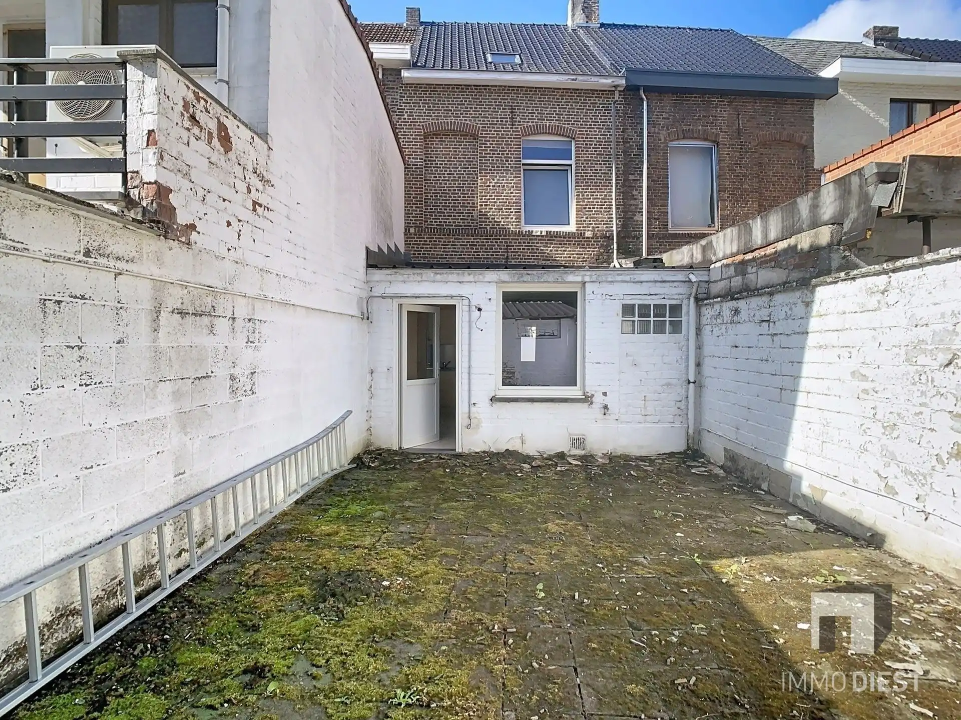 Rijwoning met 2 slaapkamers en stadstuin op gunstige locatie foto 27