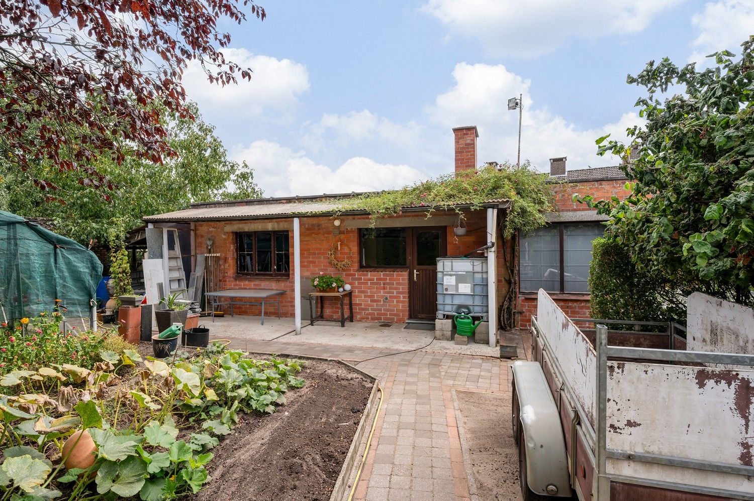 Ruime gezinswoning op breed en groot perceel van 1122m² foto 37