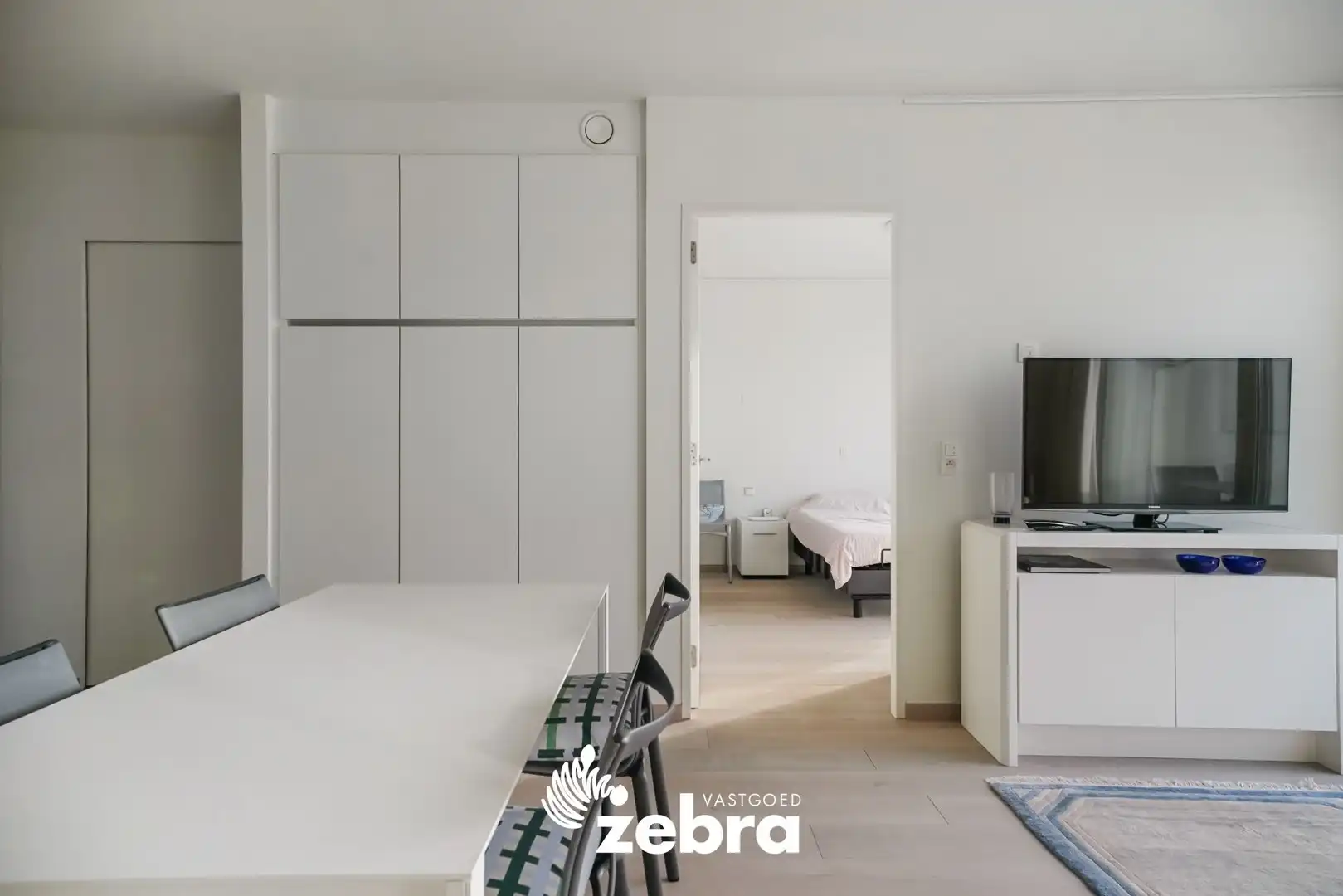 Moderne serviceflat met prachtig zicht op de Leie en autostaanplaats te Deinze! foto 3