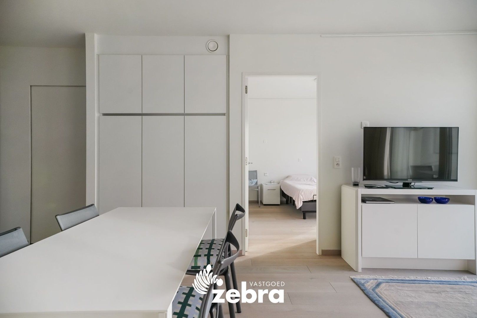 Moderne serviceflat met prachtig zicht op de Leie en autostaanplaats te Deinze! foto 3