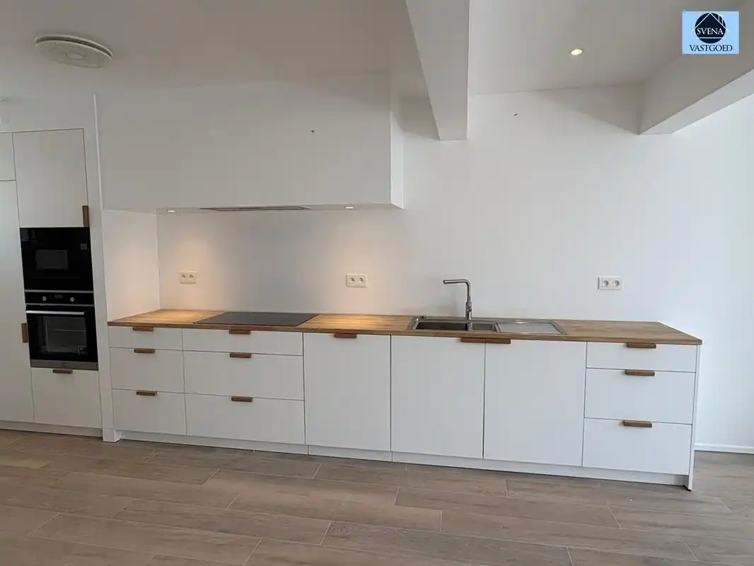GERENOVEERD APPARTEMENT MET 2 SLAAPKAMERS foto {{pictureIndex}}