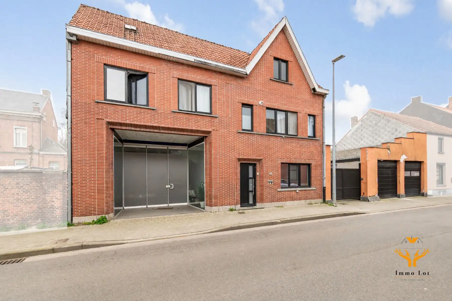 Woning met toonzaal, magazijn en garages te Hamme foto 14