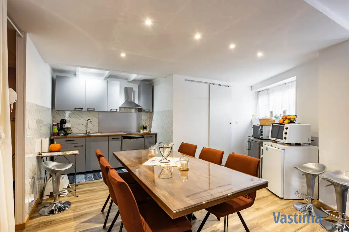 Uniek pand bestaande uit 2 woongelegenheden, garage en buitenruimte foto 6