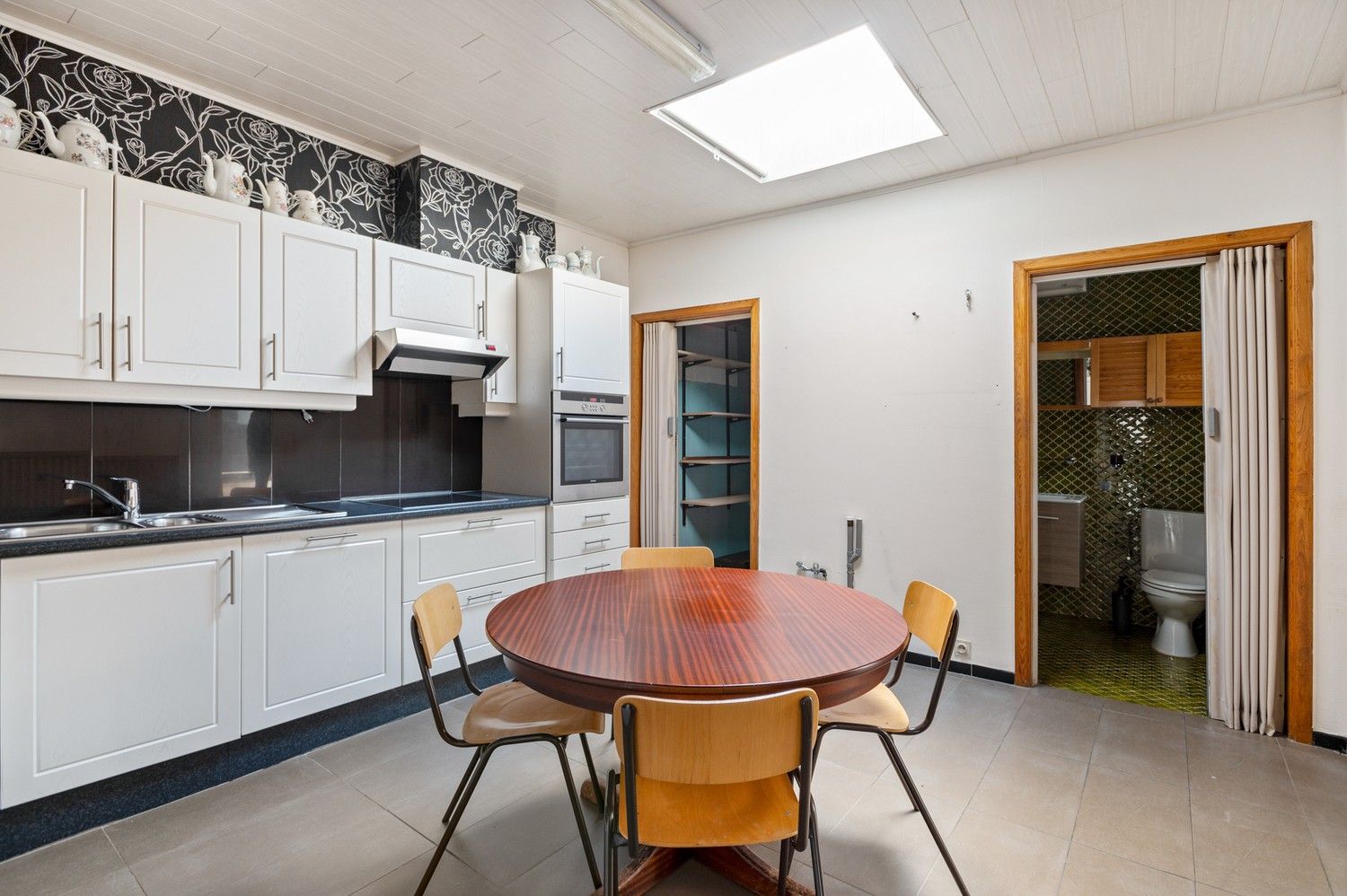 Te renoveren woning op toplocatie te Lier! foto 3