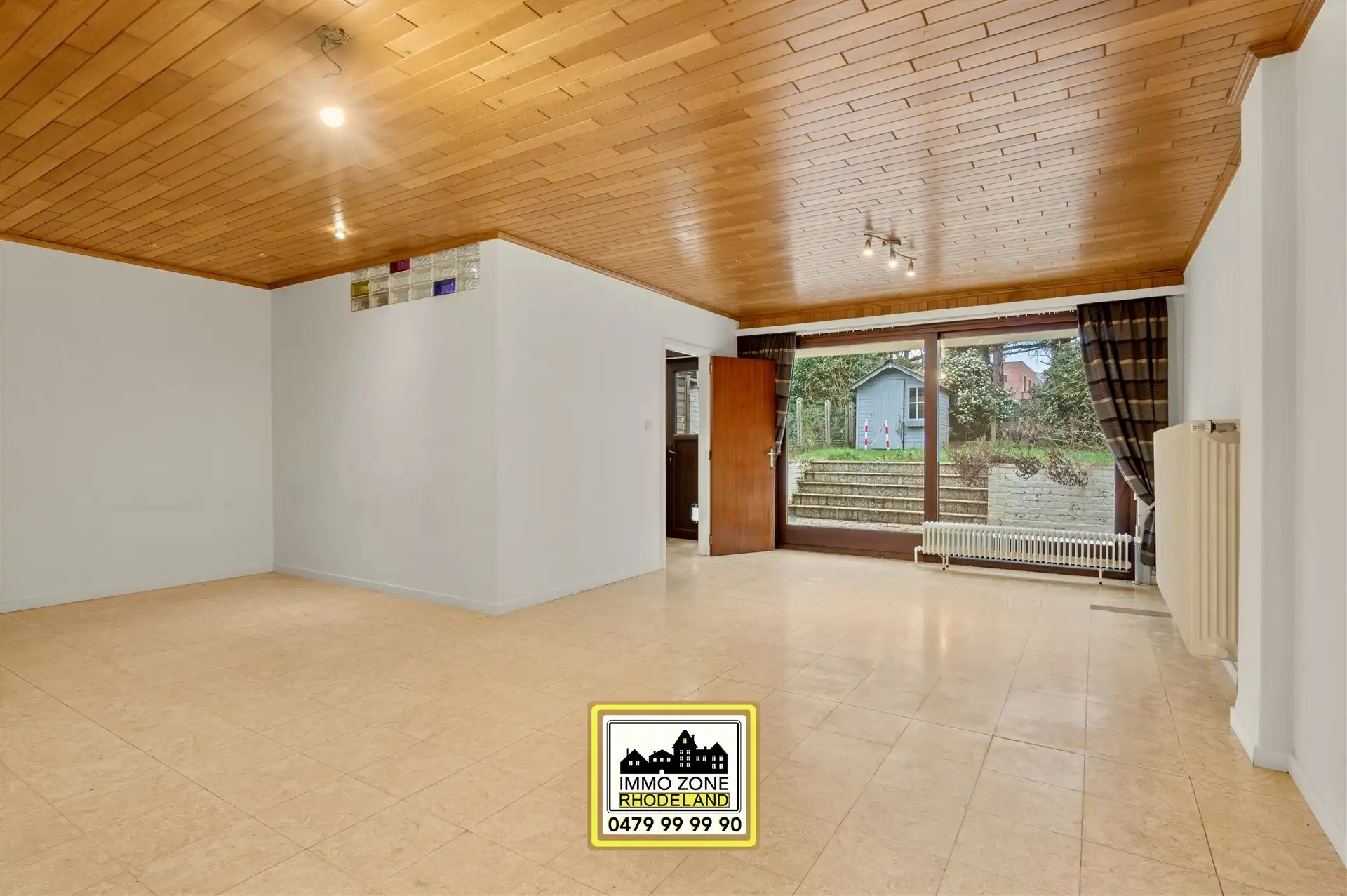 Op te frissen woning met 3 slpks, inpandige garage en tuin foto 9