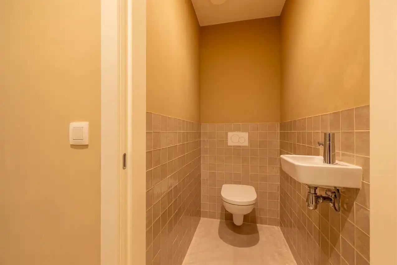 Gelijkvloers app. met twee slaapkamers, zuidterras, garage nabij bossen foto 20