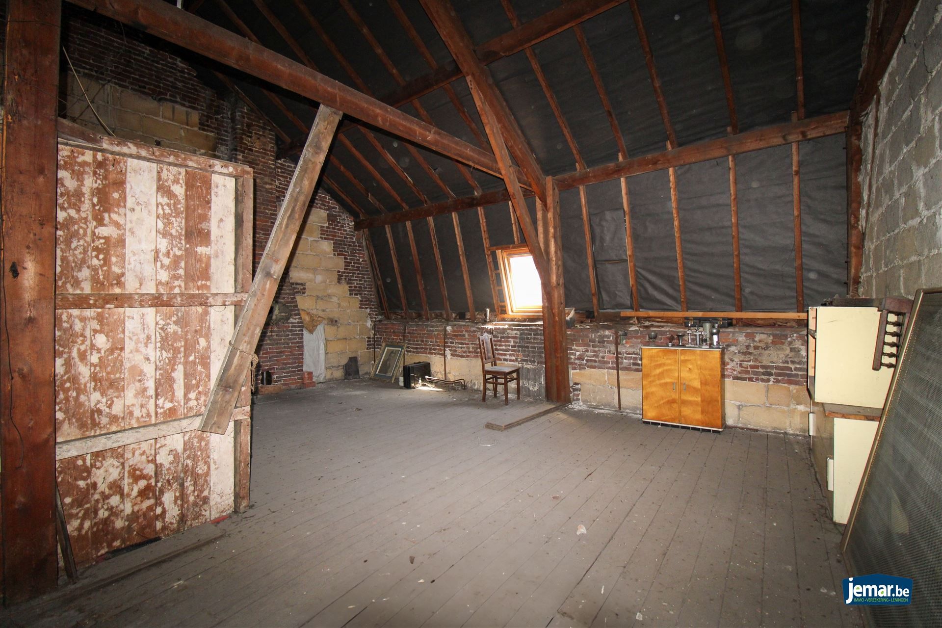 Karaktervol handelspand met woonst op toplocatie – ideaal om wonen en werken te combineren in het hart van Maasmechelen! foto 14