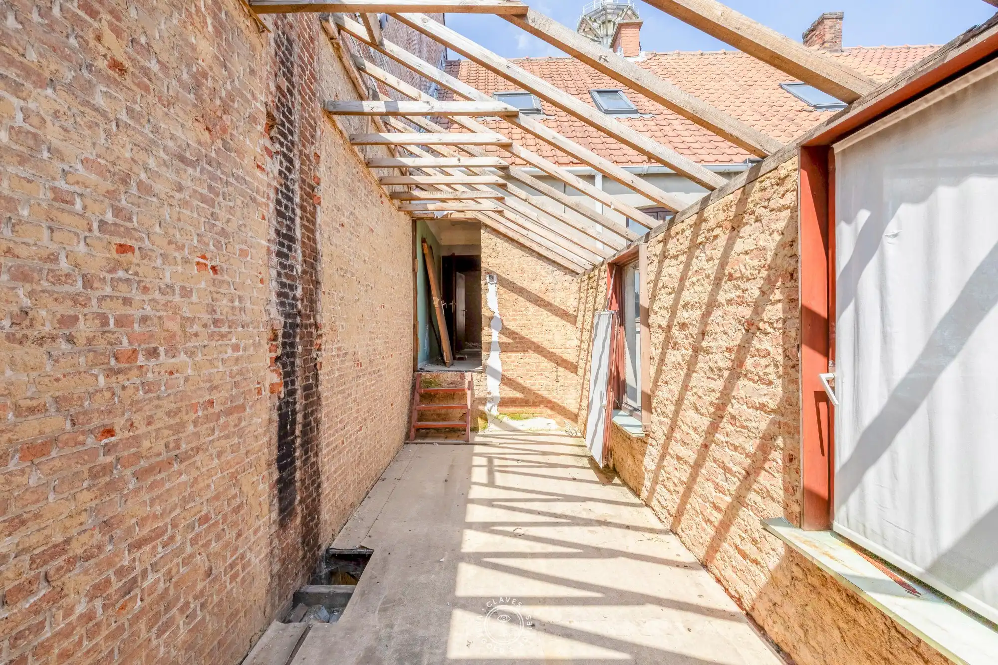 Te renoveren woning met garage in het centrum van Sint-Niklaas foto 10