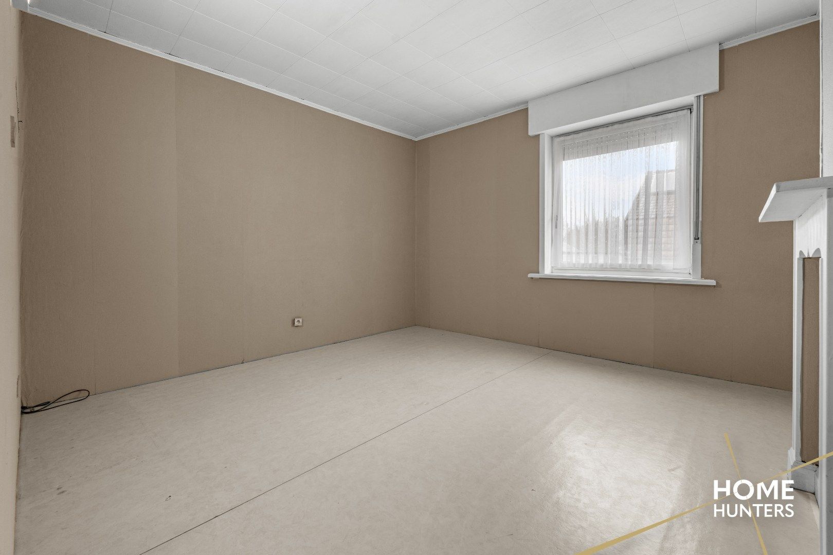 Charmante te renoveren rijwoning met 3 slaapkamers en diepe tuin op centrale ligging in Menen foto 15