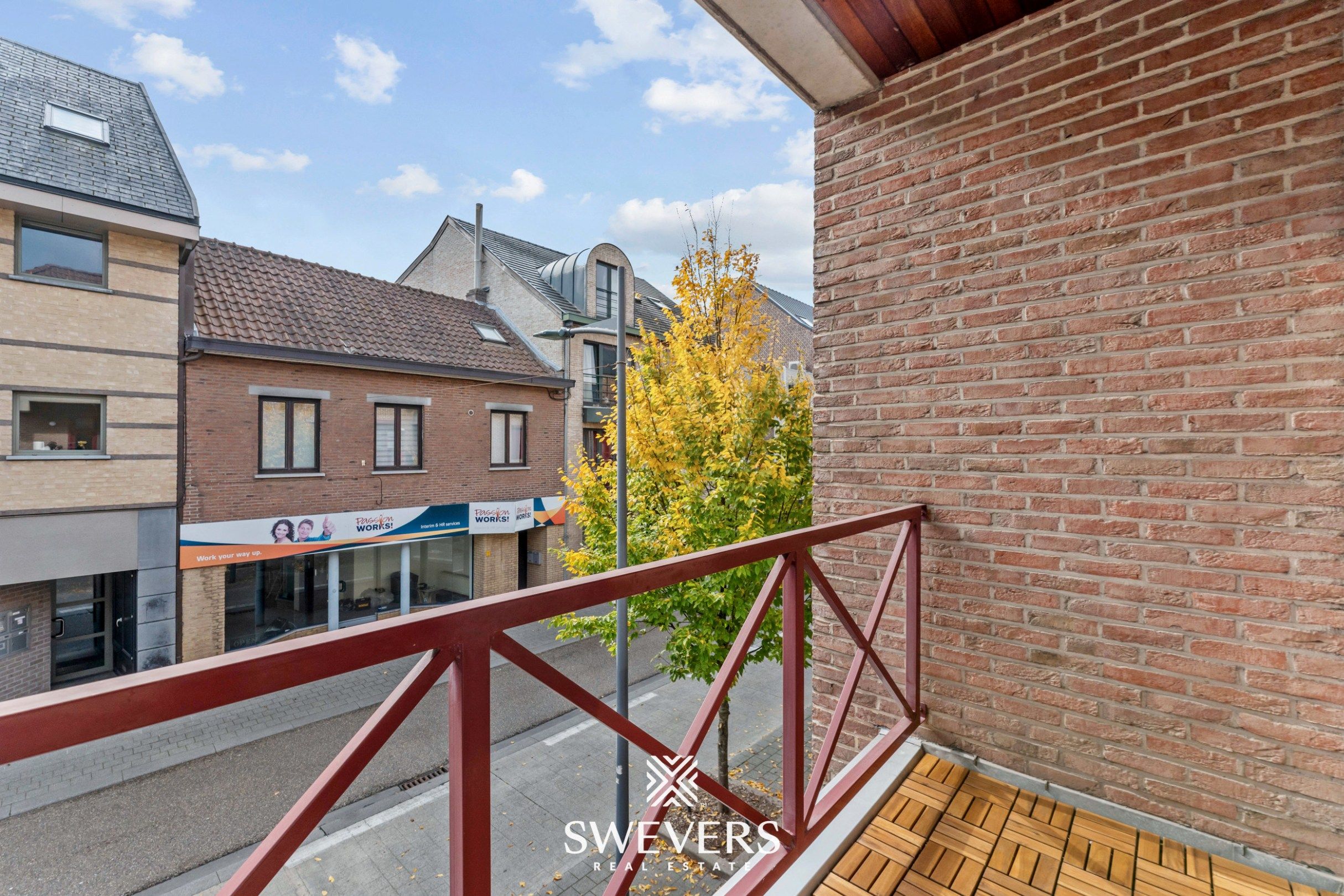 Instapklaar en lichtrijk duplexappartement in centrum Herk-de-Stad foto 20