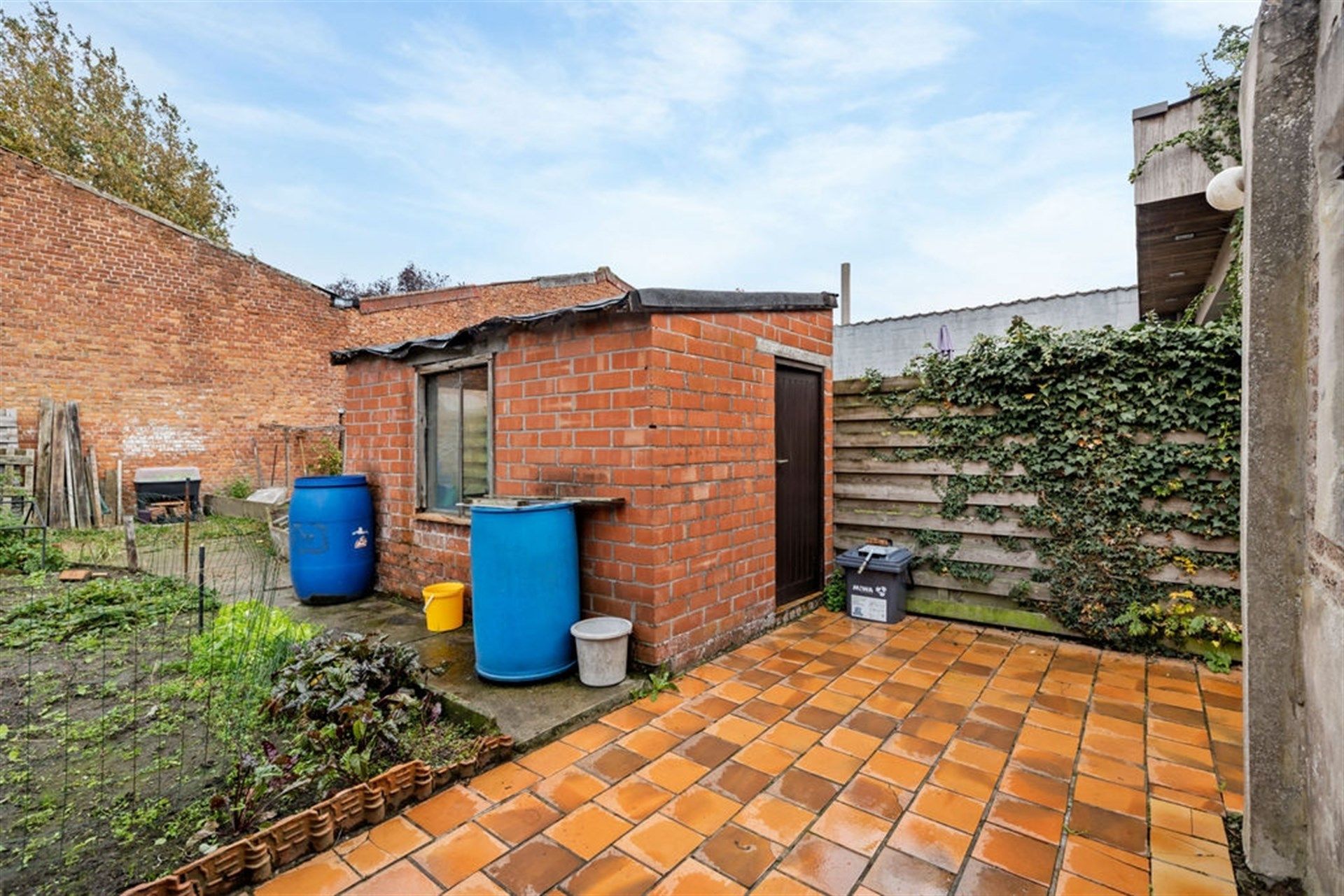 Potentiële gezinswoning of 2 bouwgronden in het hartje van Sint-Gillis-Waas foto 25