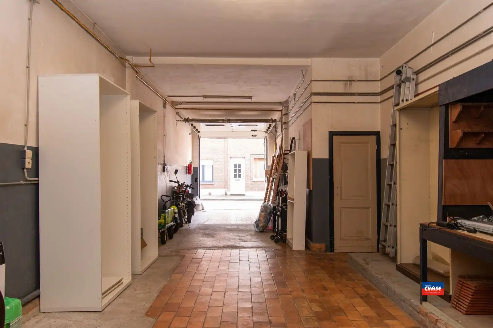 Woning met 2 slpks, magazijn en tuin foto 6