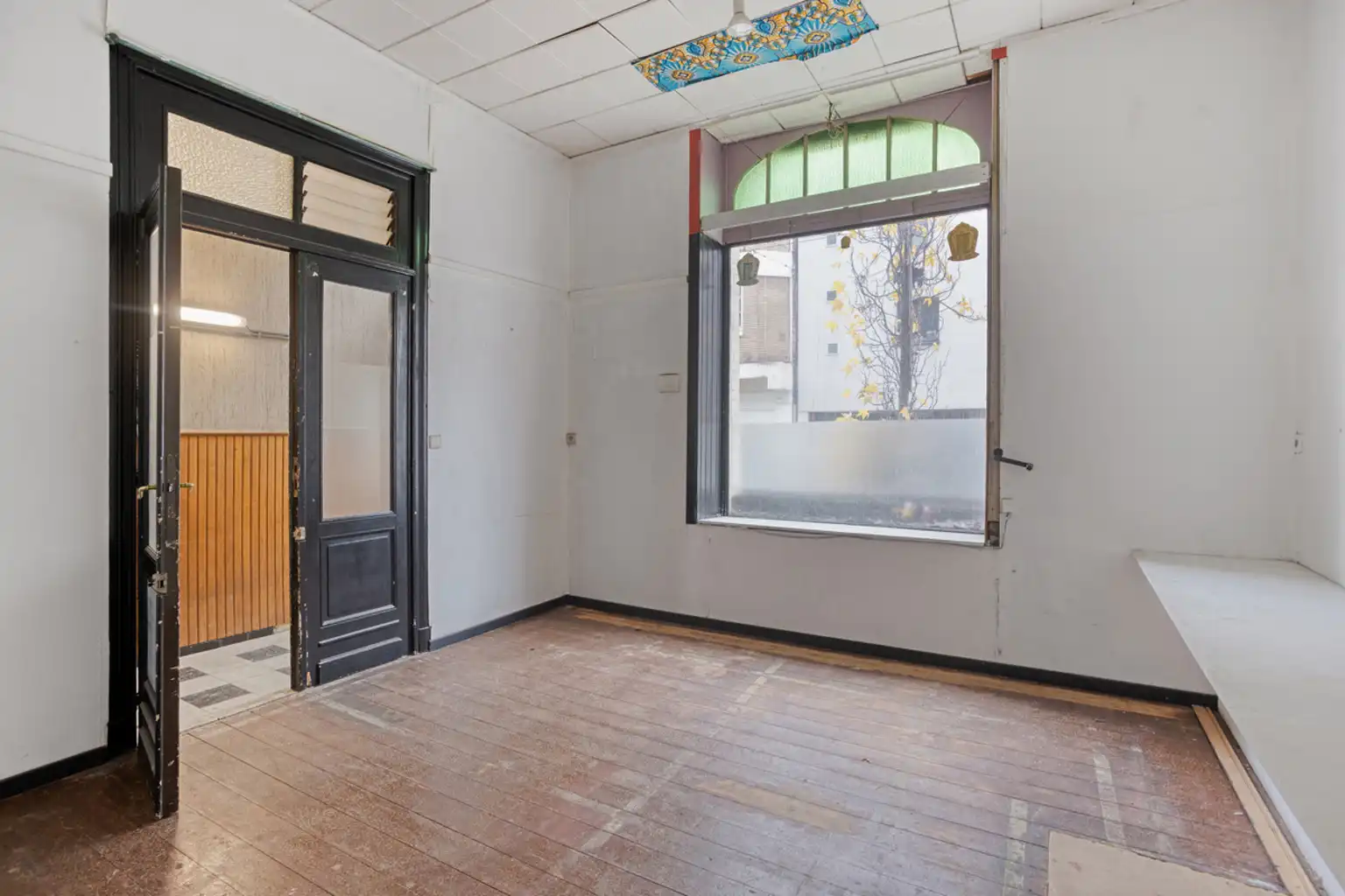 Commercieel gelijkvloers met achterliggend werkplaats foto 7